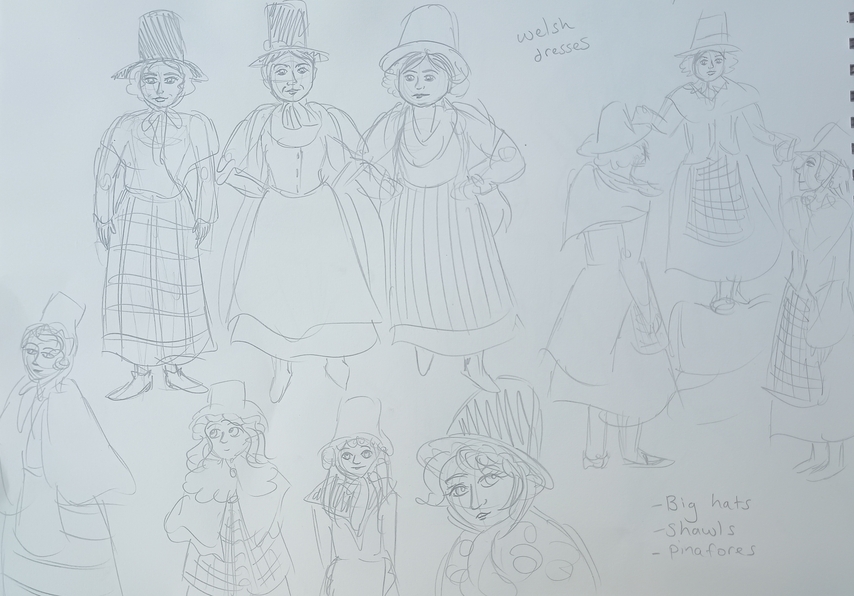 Several women and girls in traditional Welsh dresses