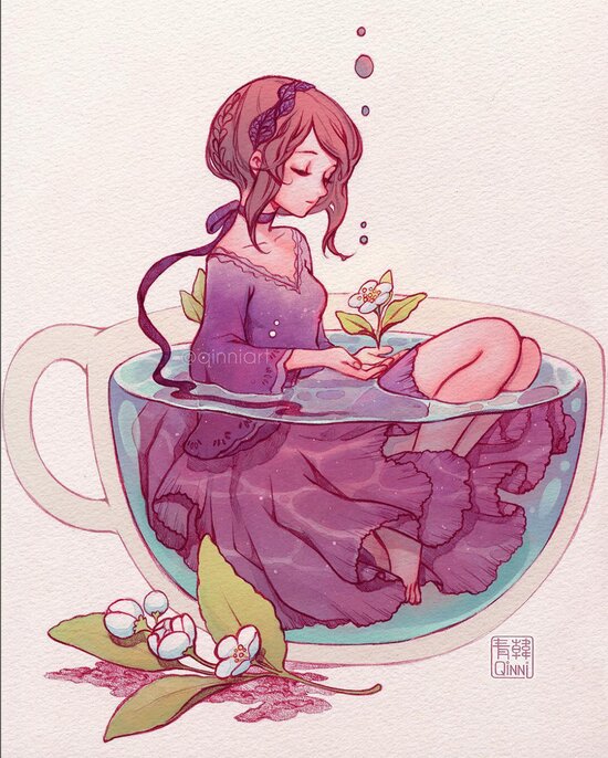 Girl in a purple dress sat in a giant teacup