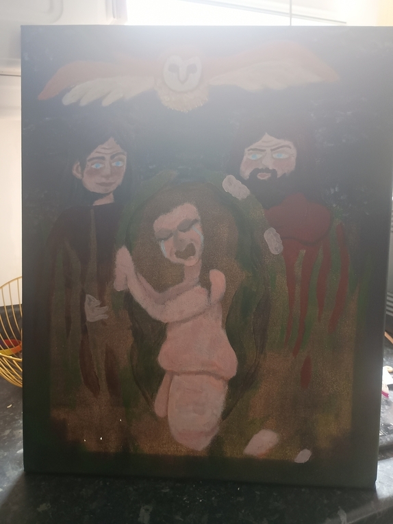 A partially complete version of my painting, the incomplete parts are glowing from the light behind. The light makes the picture look very hazy.